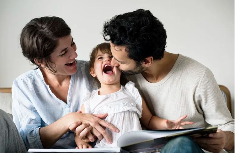 parents reading with their child